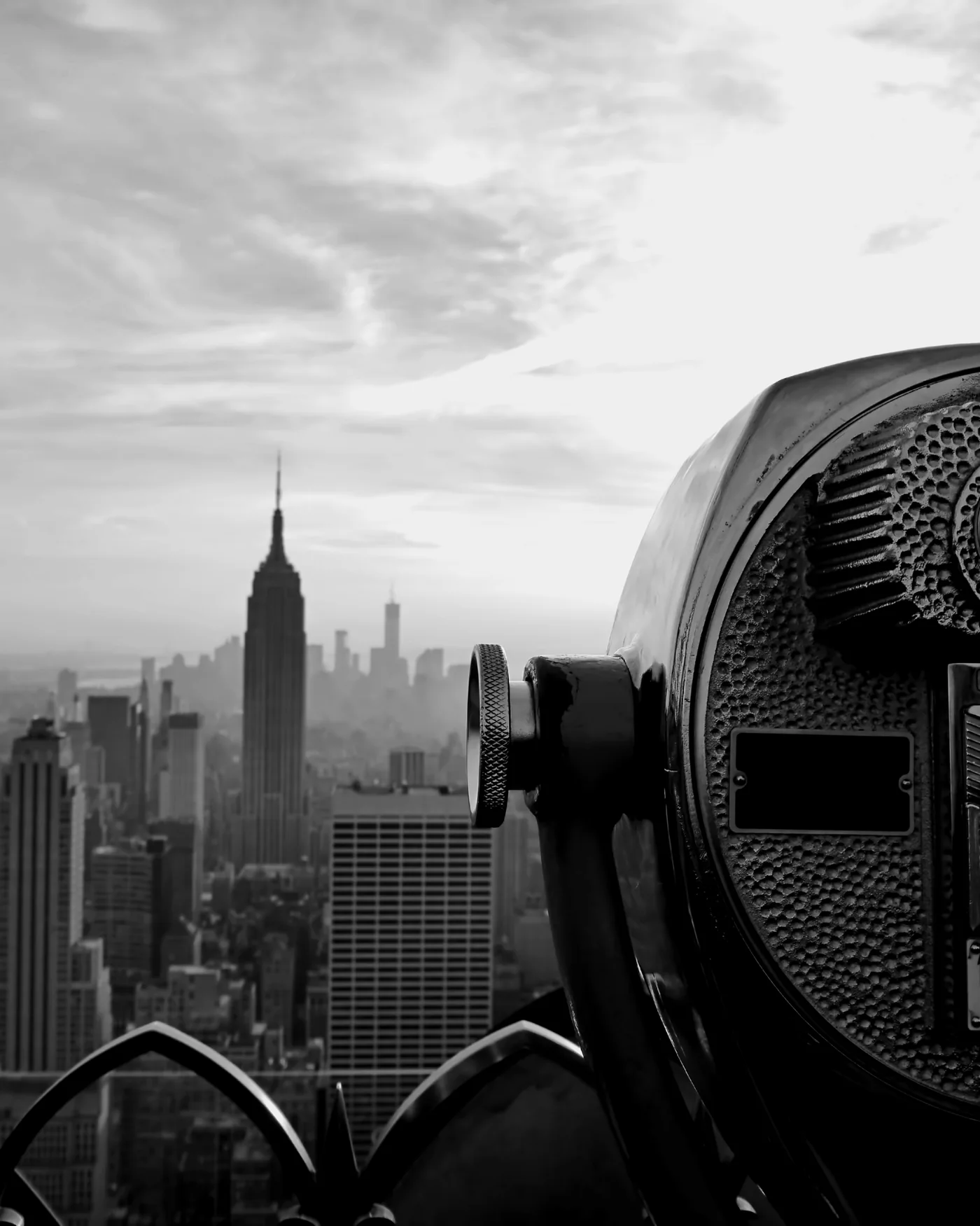 A viewing scope trained on the Manhattan skyline